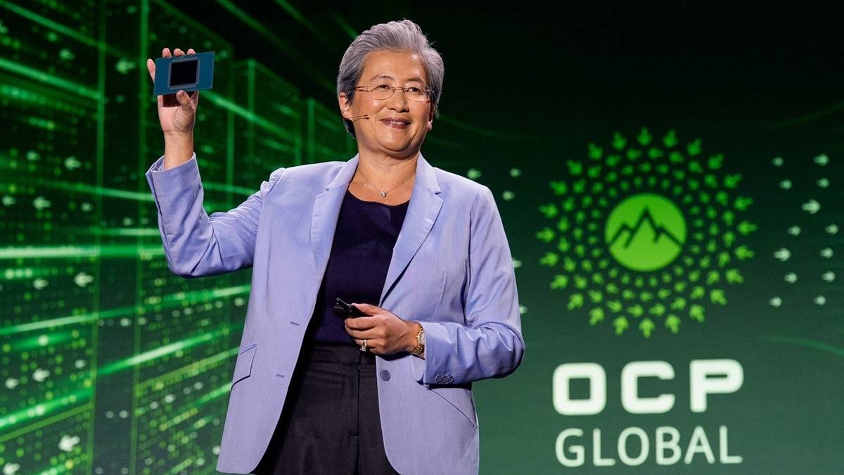 AMD chief executive Lisa Su holds up a processor on stage at the OCP Global Summit
