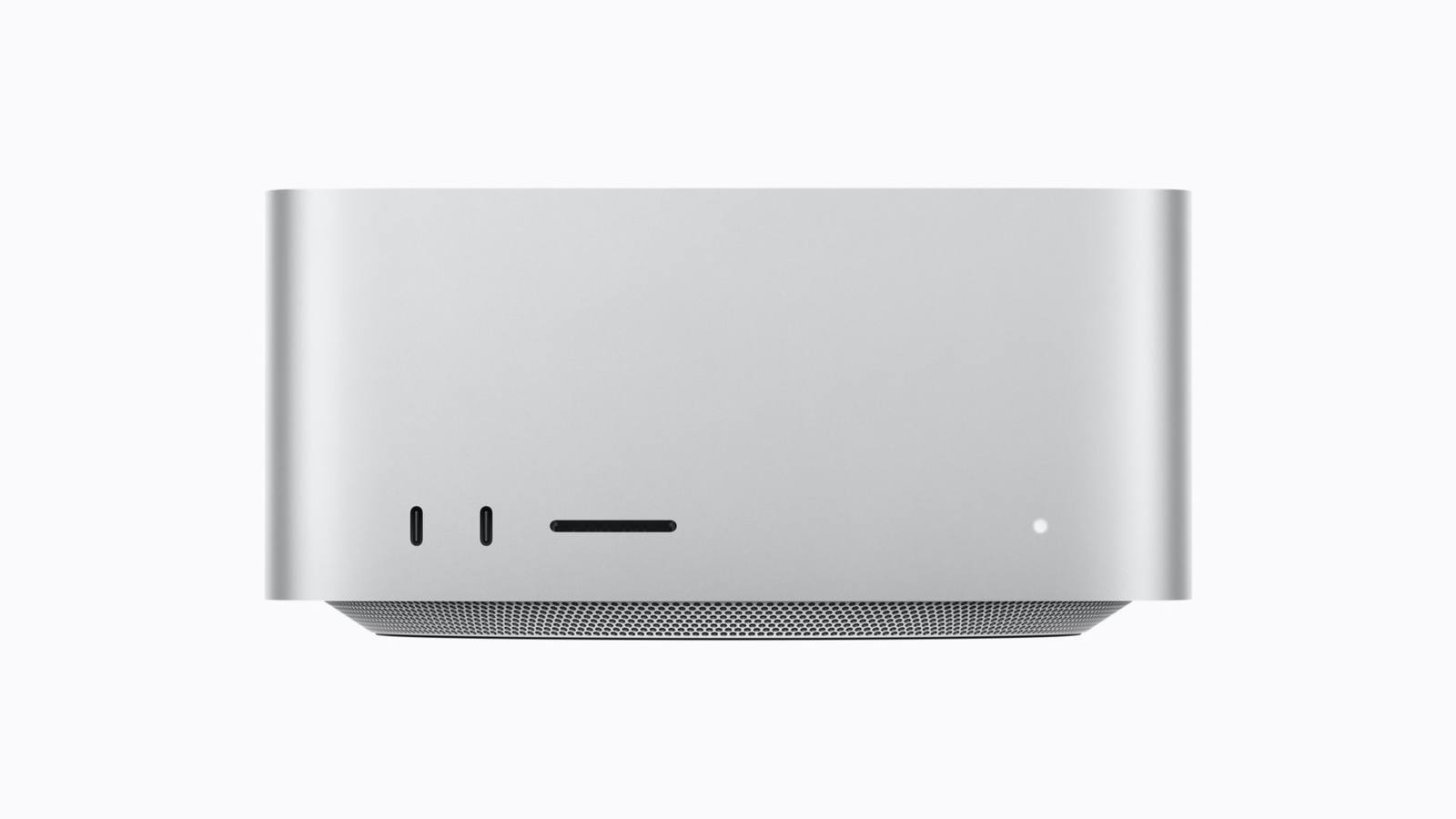 Front view of Apple's silver Mac Studio desktop with two USB C ports and an SD card slot on a white background