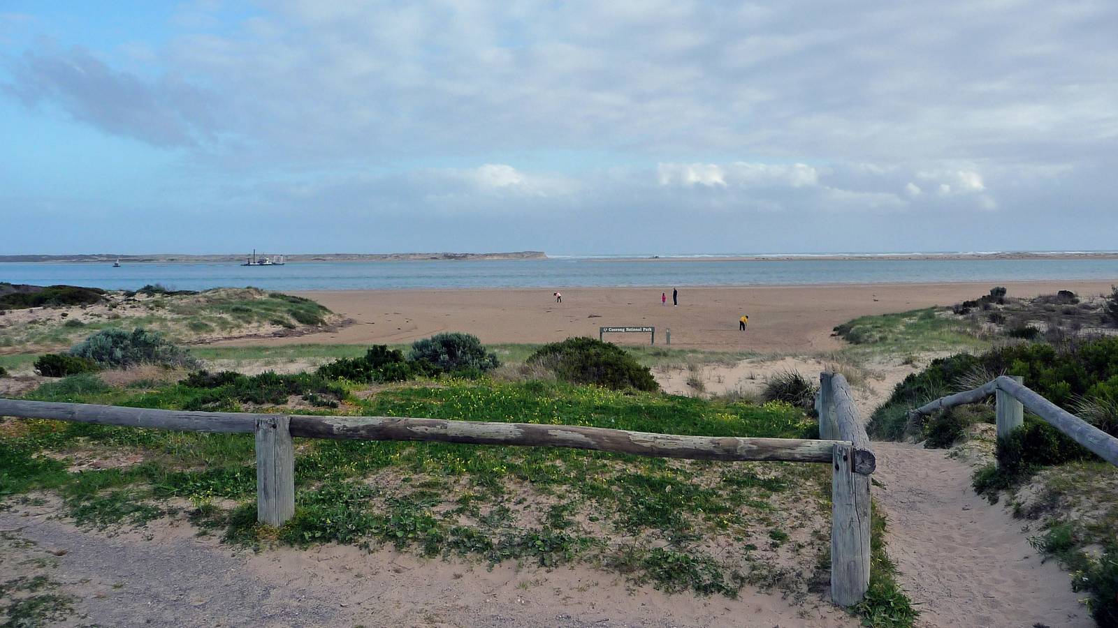 The mouth of the Murray River near Goolwa under a cloudy sky