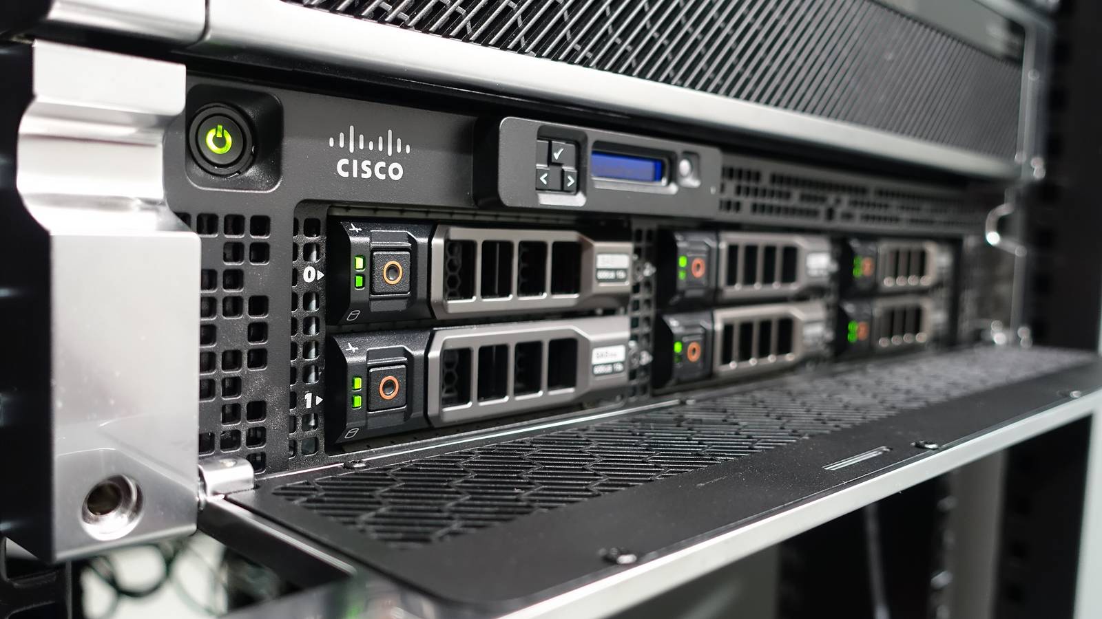 Close view of a Cisco IronPort C670 email security appliance front panel with drive bays in a rack