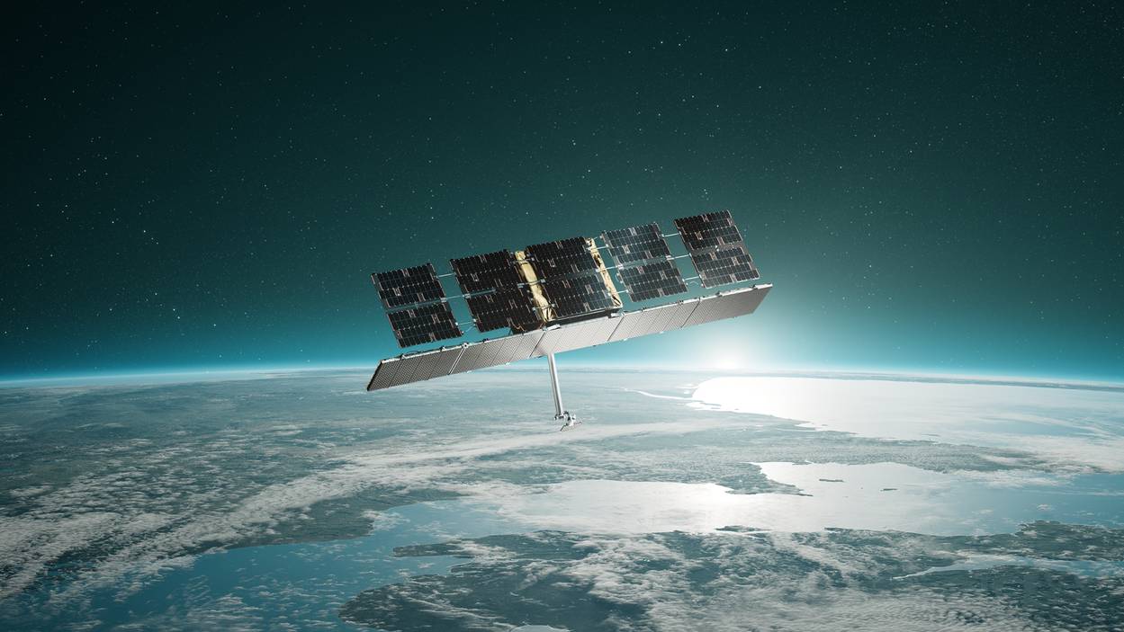 Artist's impression of an ICEYE radar satellite with solar panels orbiting above Earth