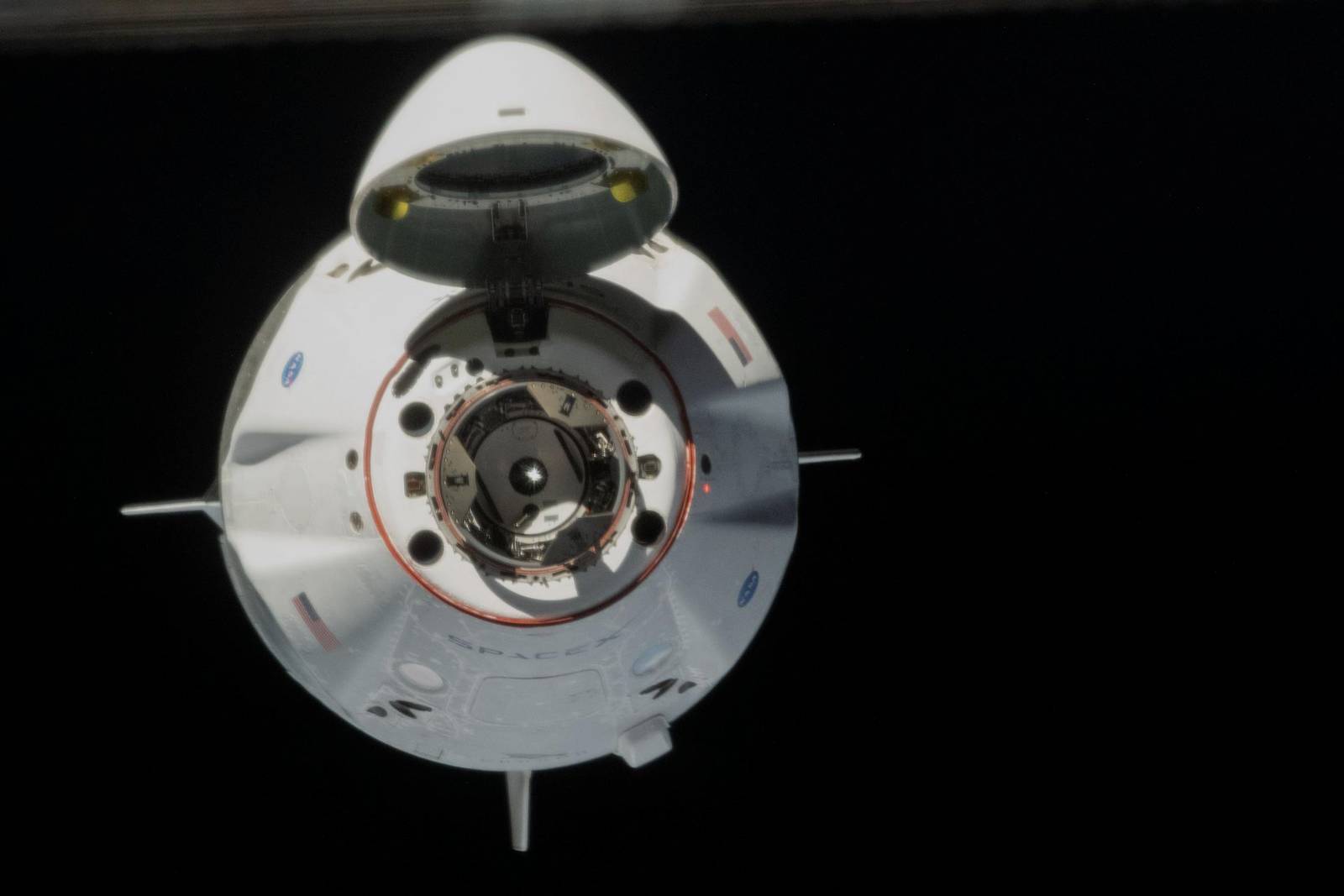 Crew Dragon approaching the ISS, nose cone open, object only