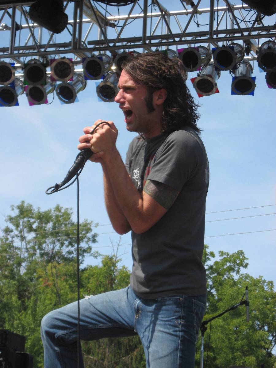Disciple singer Kevin Young singing outdoors at a festival