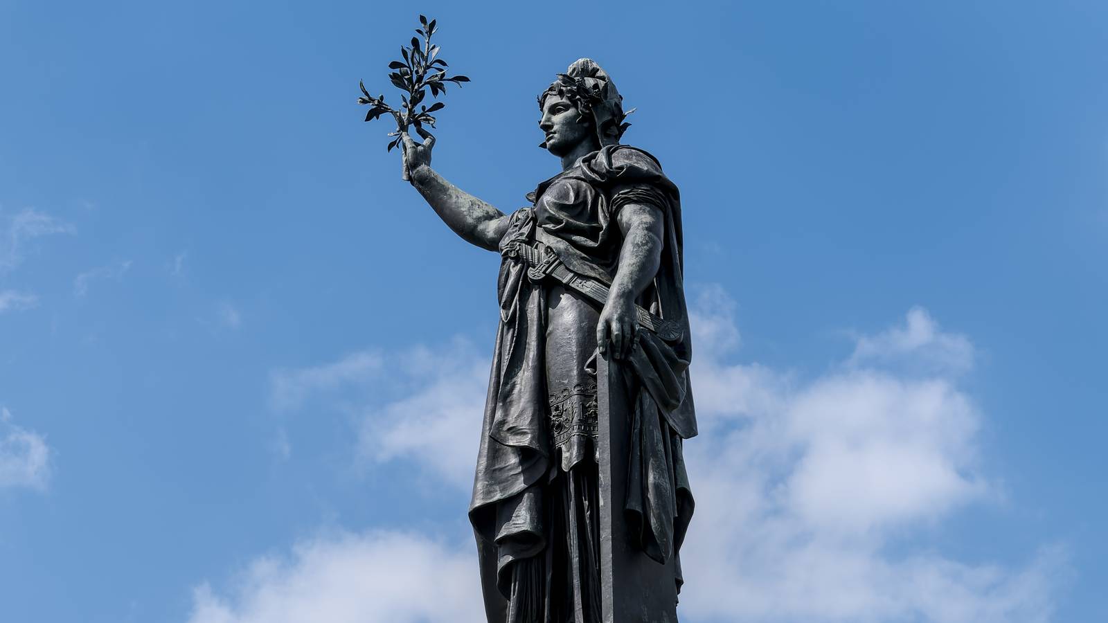 The bronze Marianne statue on the Monument to the Republic at Place de la République in Paris