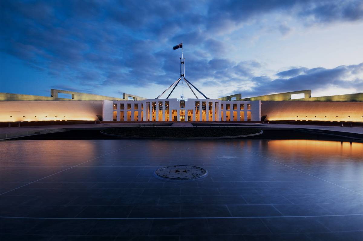 Front view of Parliament House, Canberra, with the flag mast