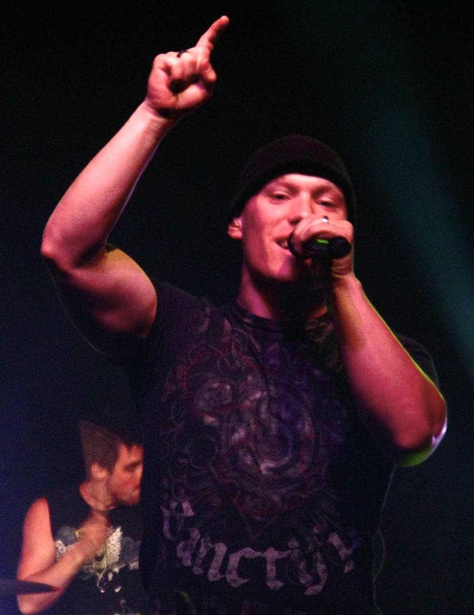 Kutless singer Jon Micah Sumrall singing on stage