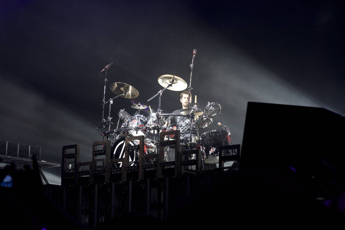 Linkin Park's drum kit and stage lit in cool blue at the Globe Arena