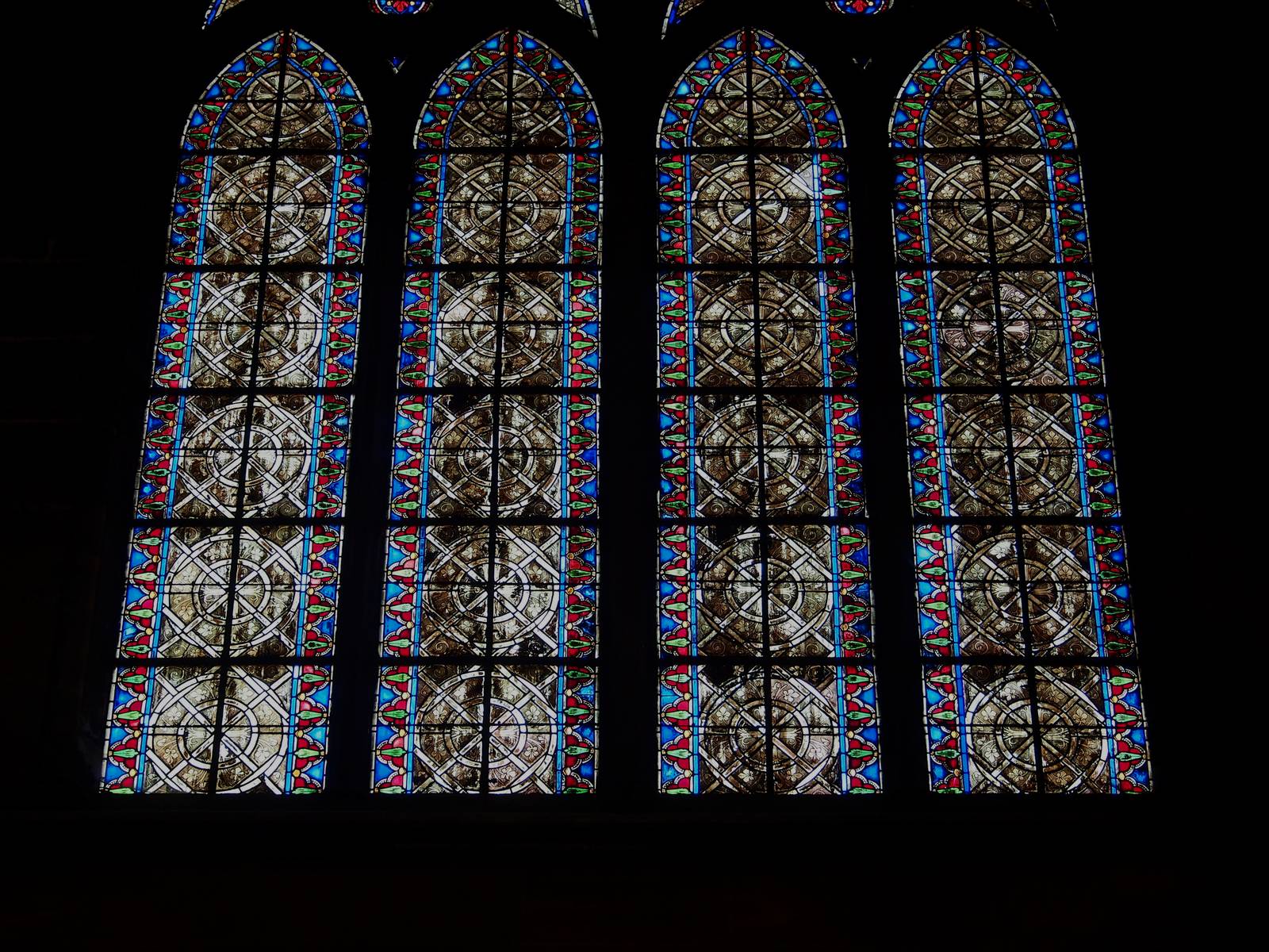 Geometric stained glass lancets in Metz Cathedral