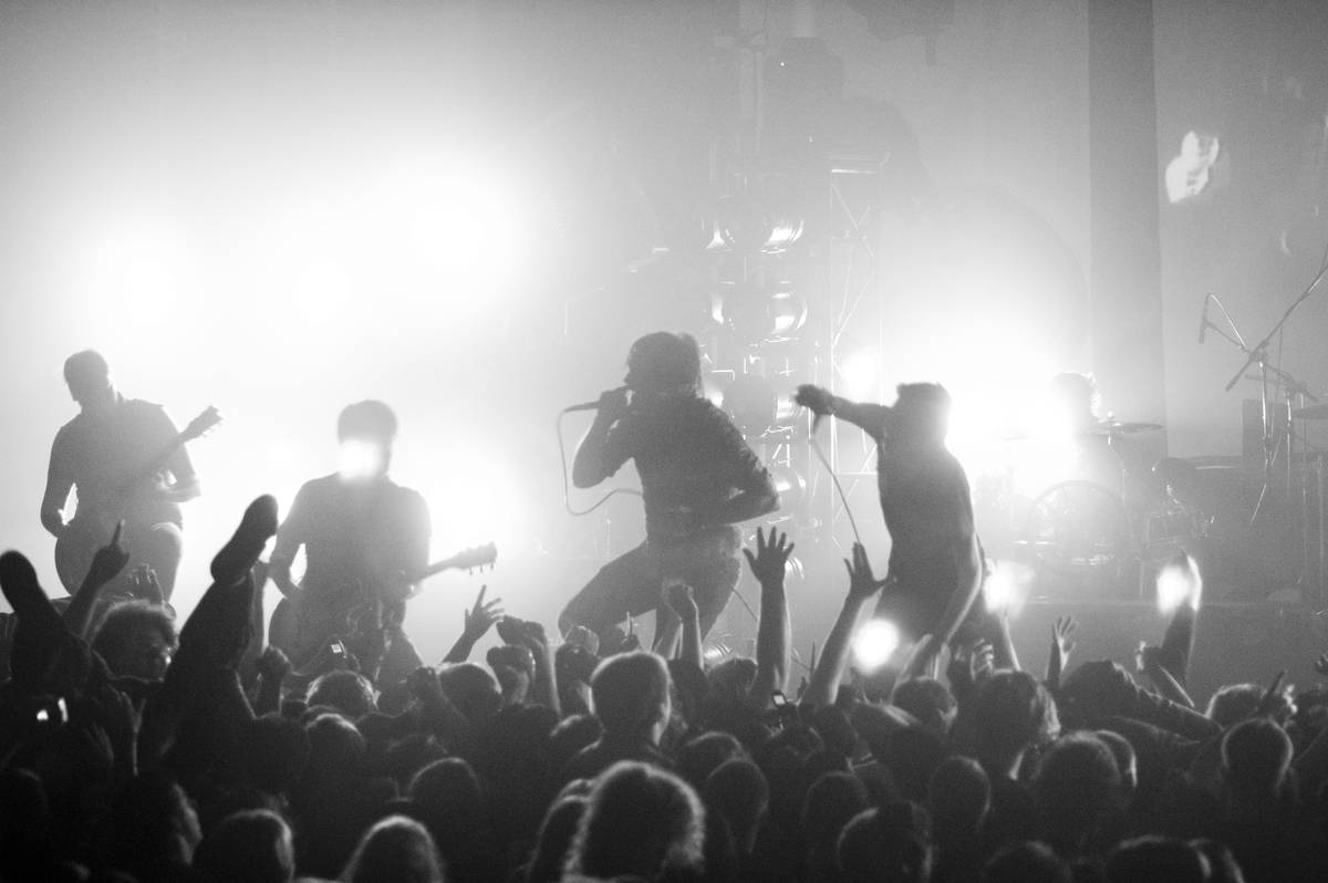 Black and white shot of Norma Jean playing live on a club stage
