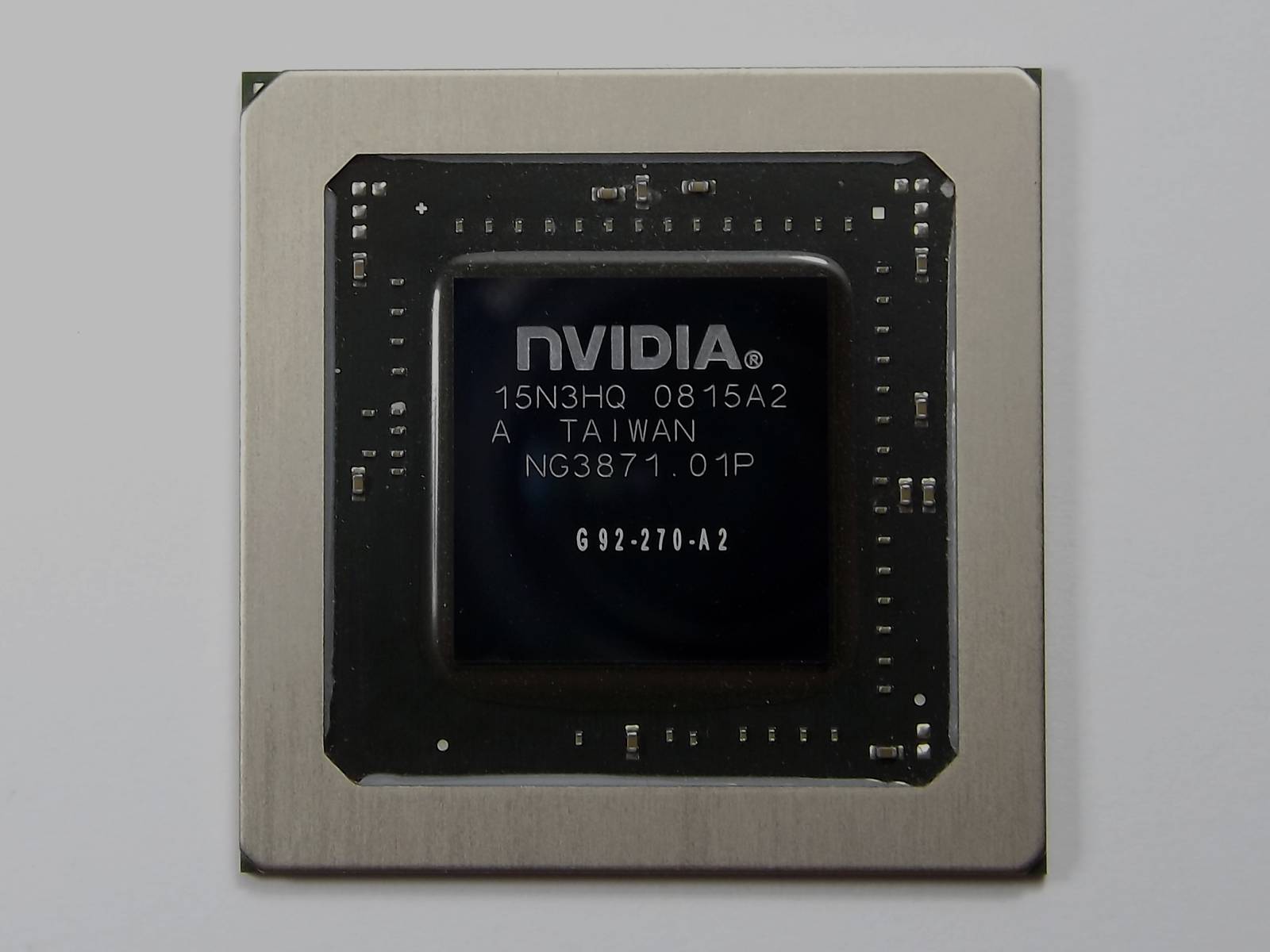 Darkened bare NVIDIA GPU chip on its package