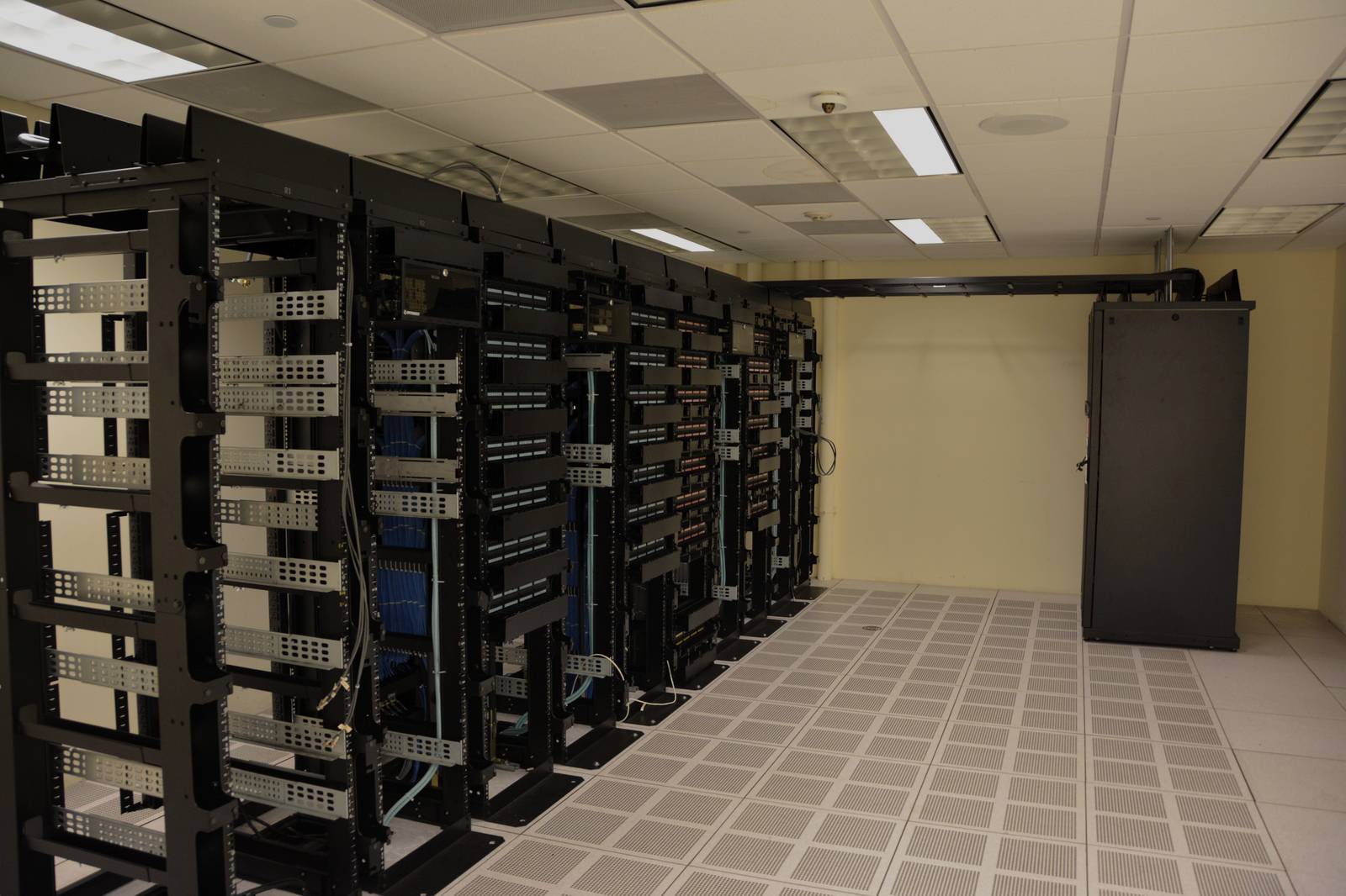 Darkened datacenter server racks