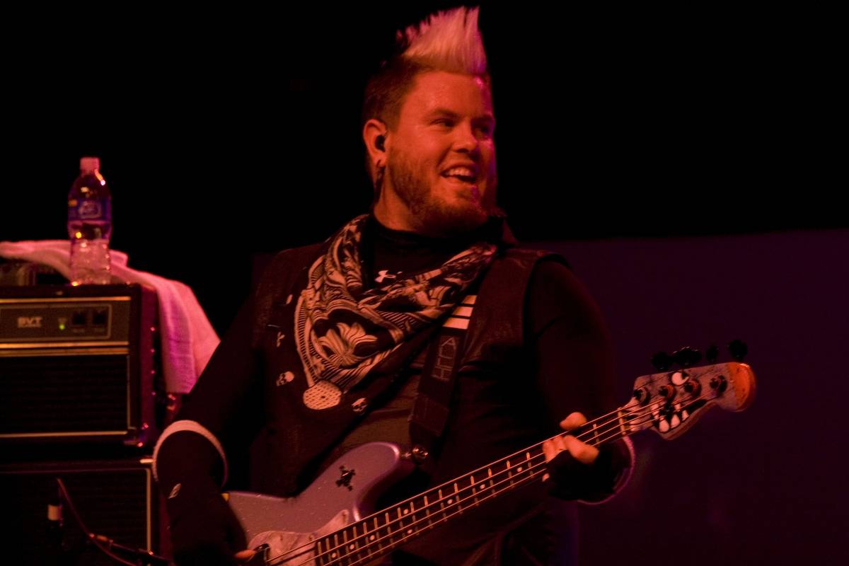 Pillar bassist Rich Gilliland playing on stage