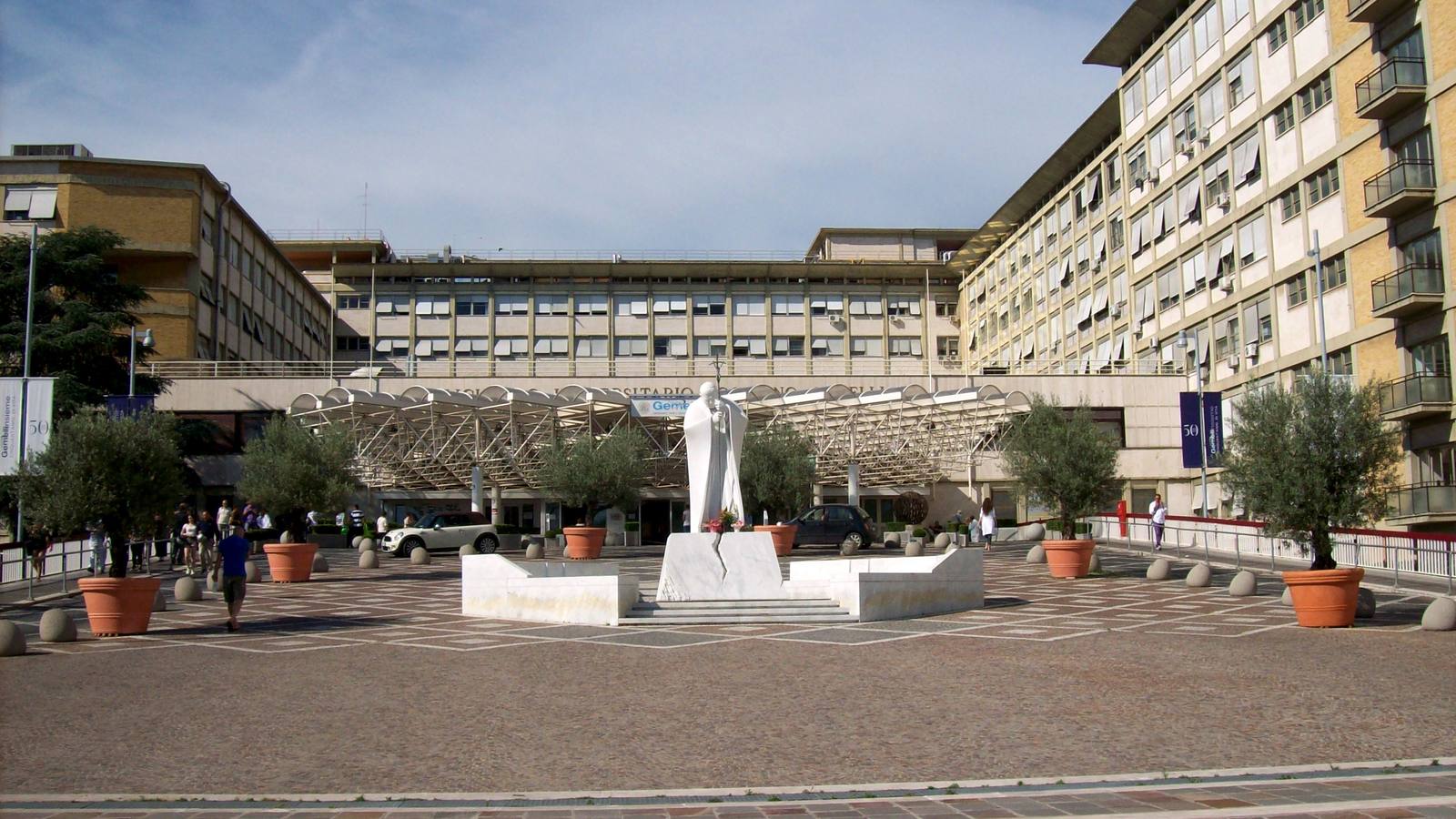The forecourt of Rome's Gemelli hospital with a white marble statue of John Paul II in front of the main entrance