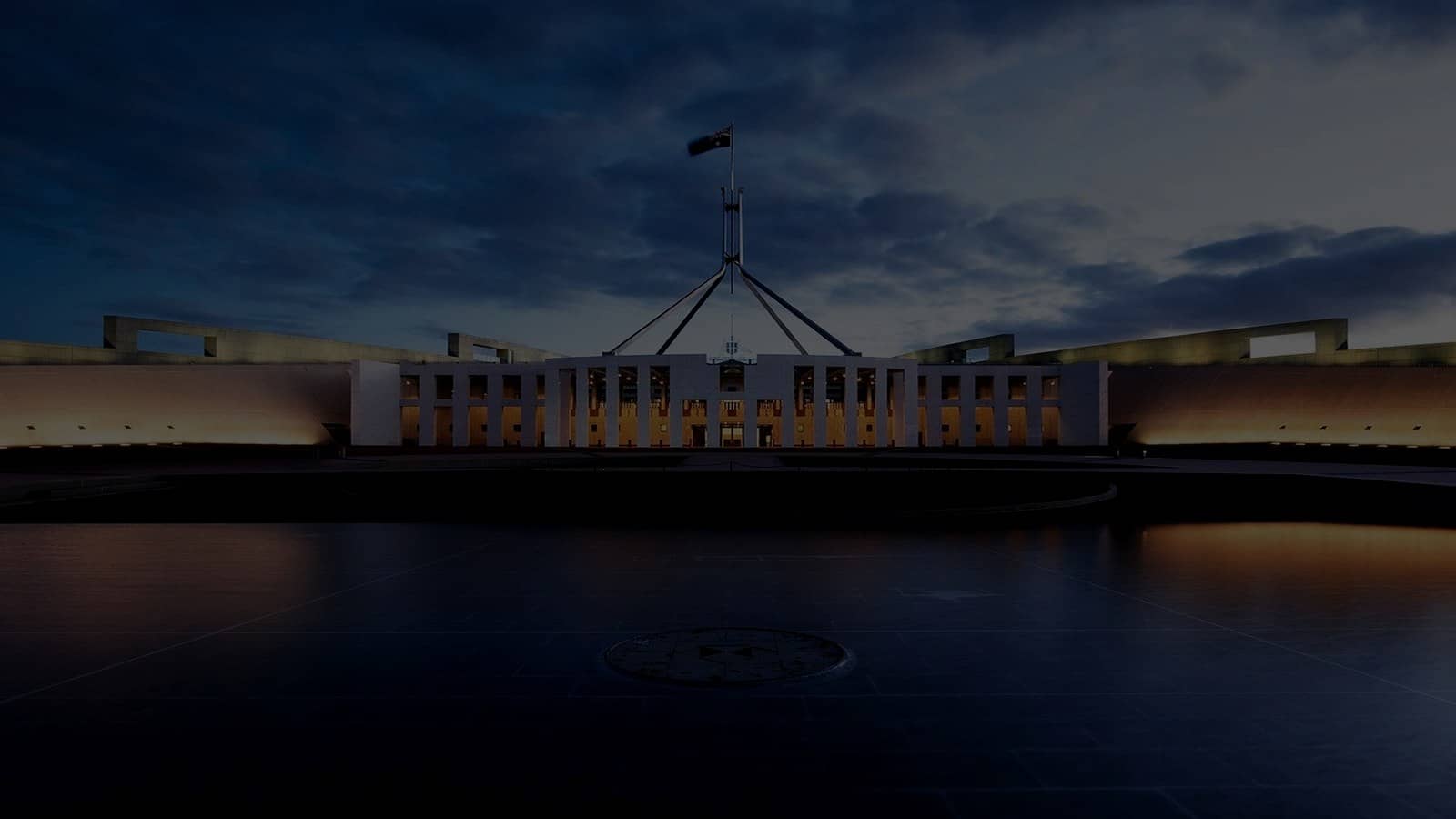 Tighter crop of Parliament House facade and flagmast, Canberra