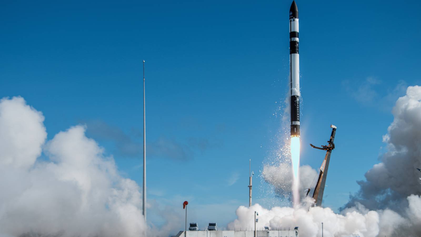 A Rocket Lab Electron rocket lifts off in clouds of exhaust from Launch Complex 1 in New Zealand