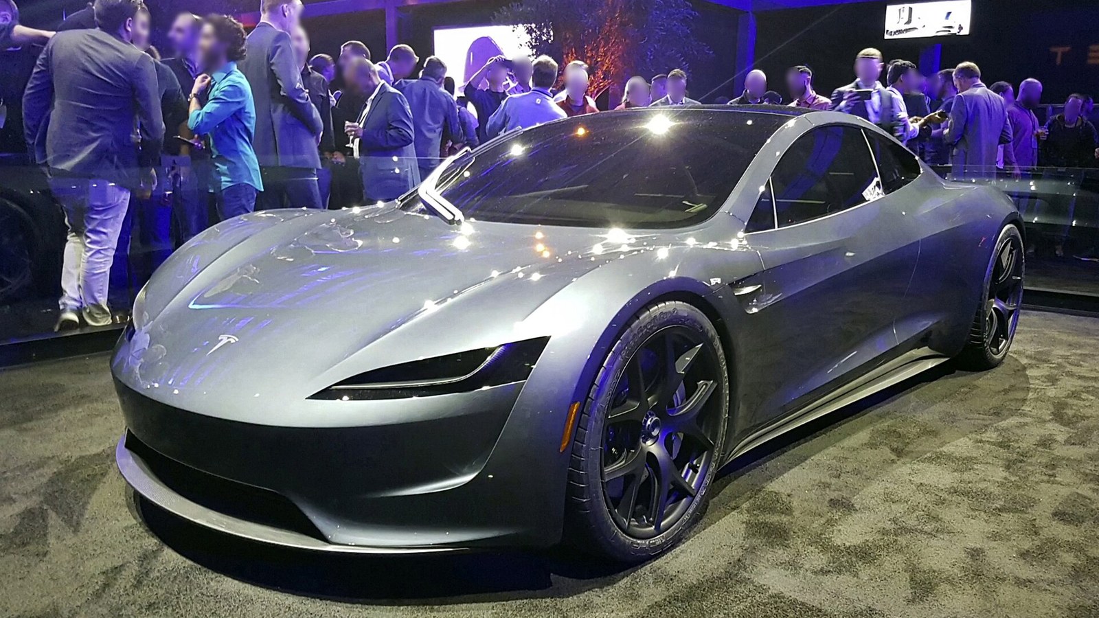 Tesla's new Roadster, nine years late, finally shows Friday