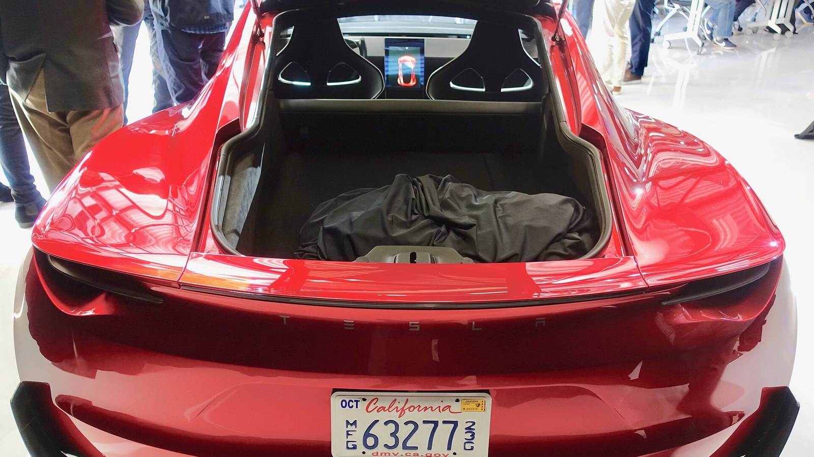 Tesla's new Roadster, nine years late, finally shows Friday