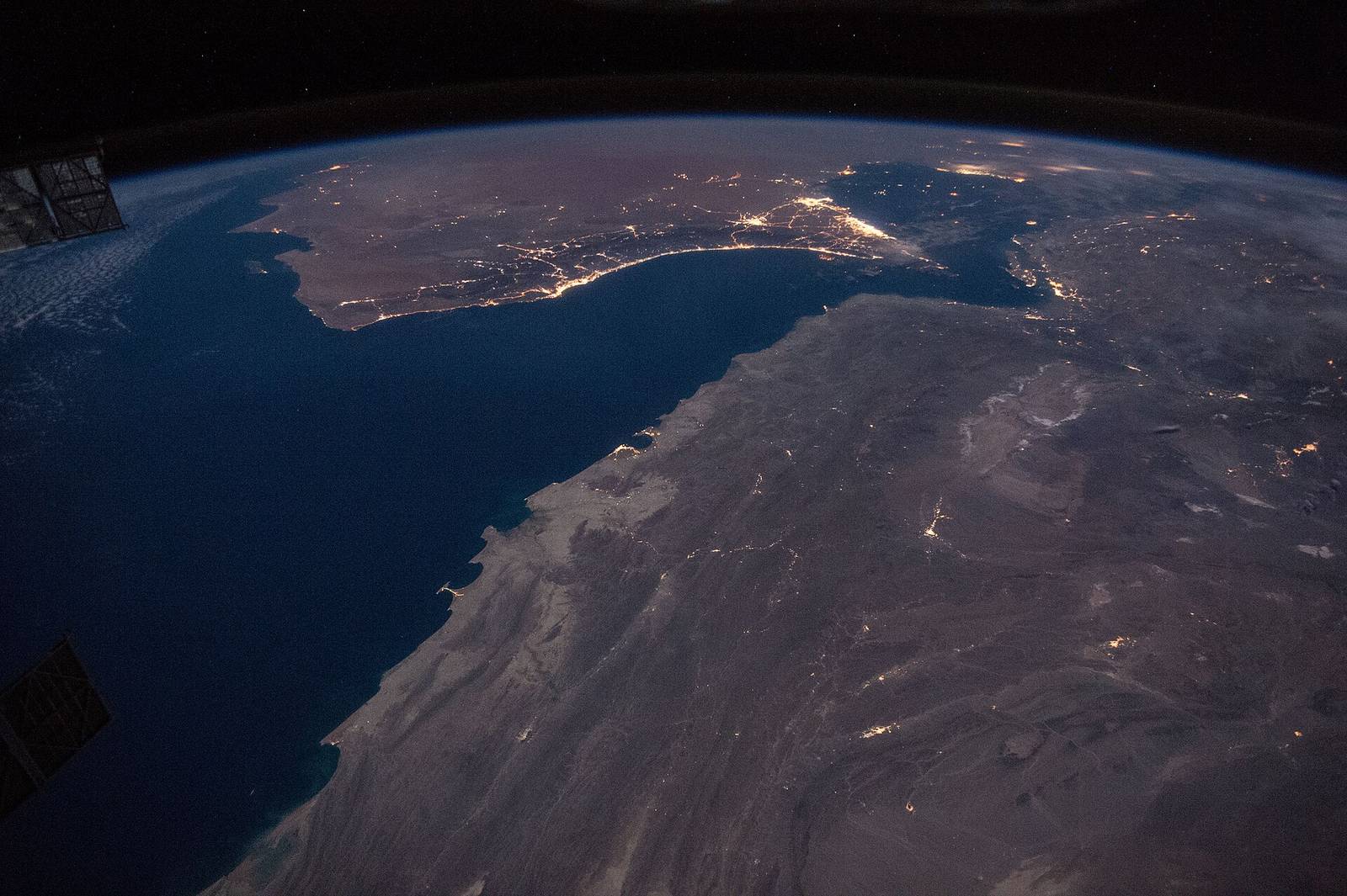 Night view from the International Space Station of the Gulf of Oman and the approaches to the Strait of Hormuz