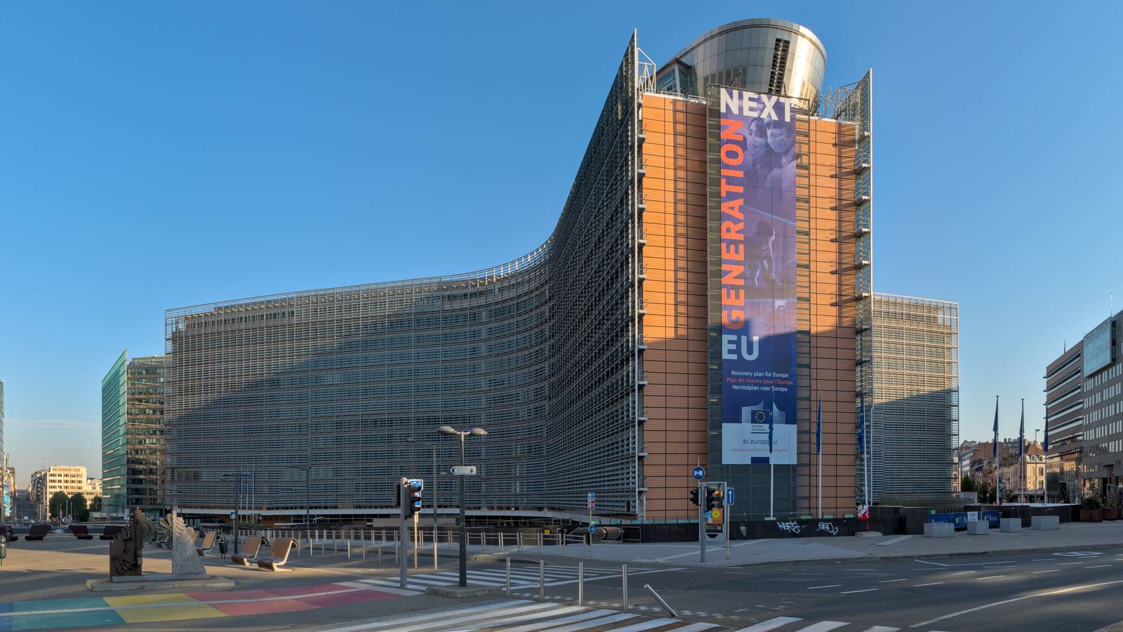 The Berlaymont building in Brussels, headquarters of the European Commission, under a clear blue sky