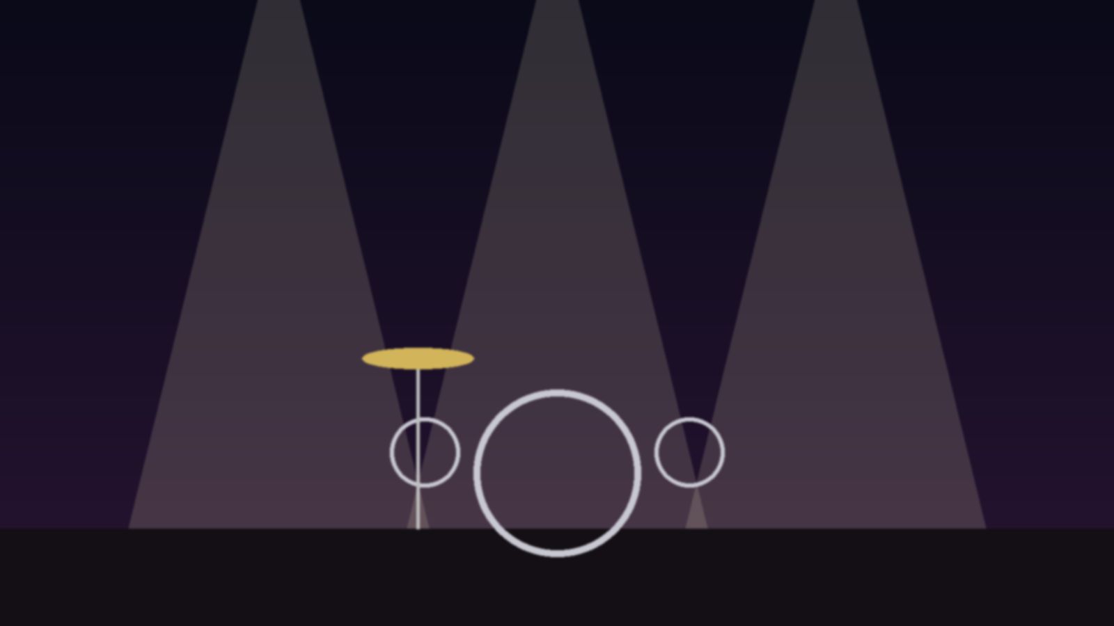 A simple drum kit with a gold cymbal on a dark stage, lit by three soft beams of light.