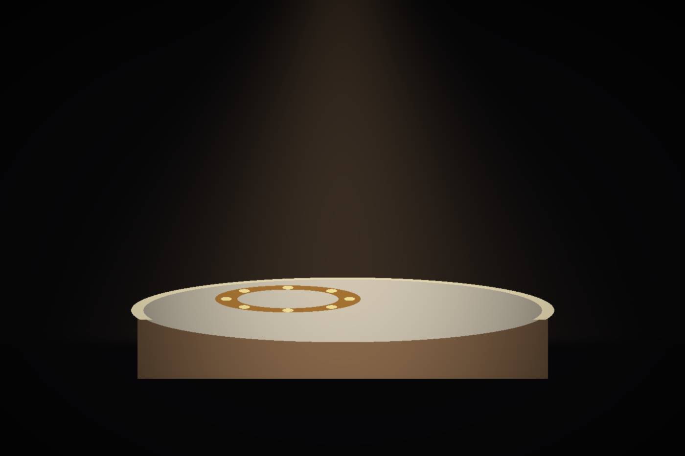 A snare drum under a single warm stage light, with a tambourine resting on its head.